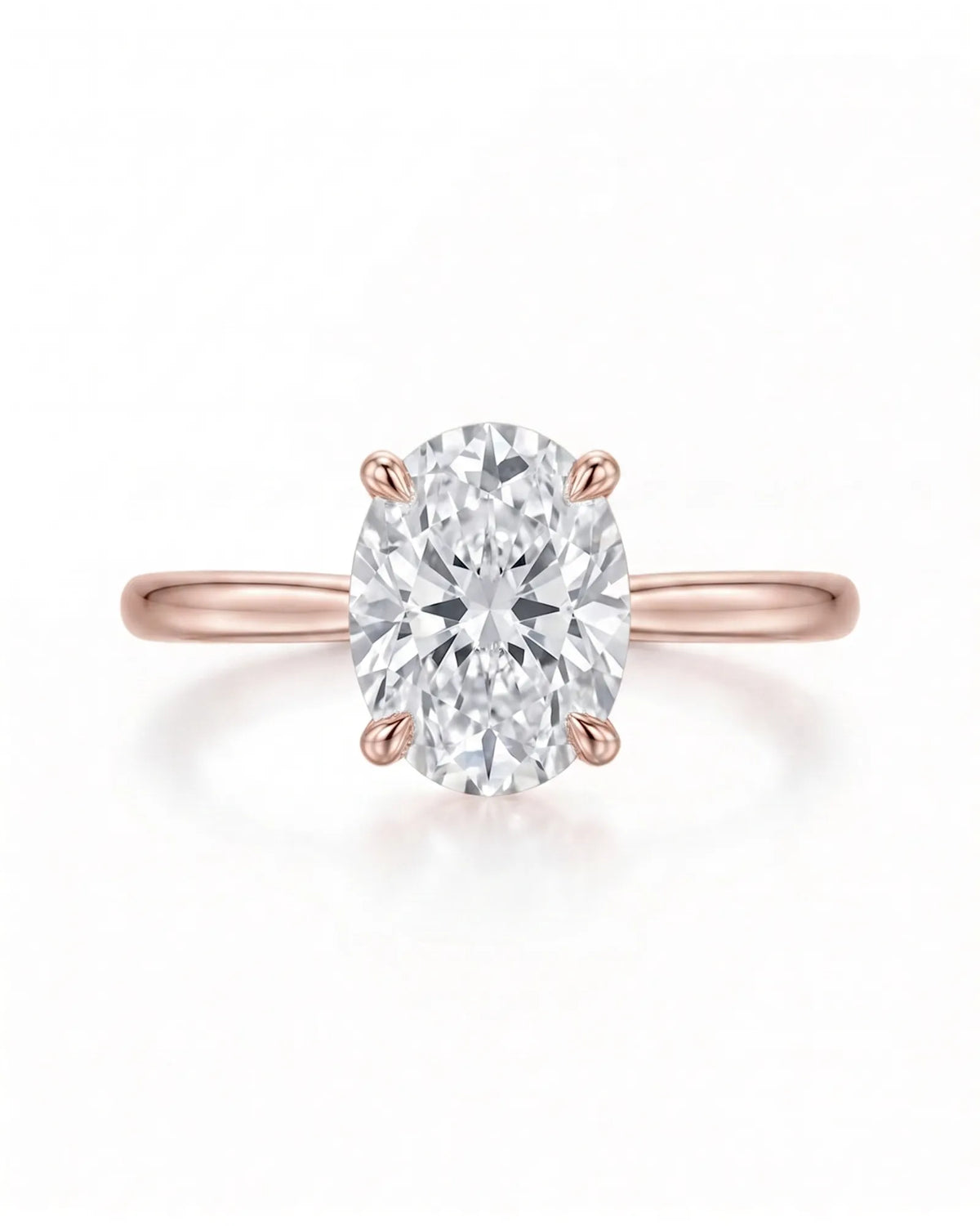 MIA 1 carat F-colour oval natural diamond cathedral solitaire ring in 18K rose gold, front view of four-prong centre | SARATTI