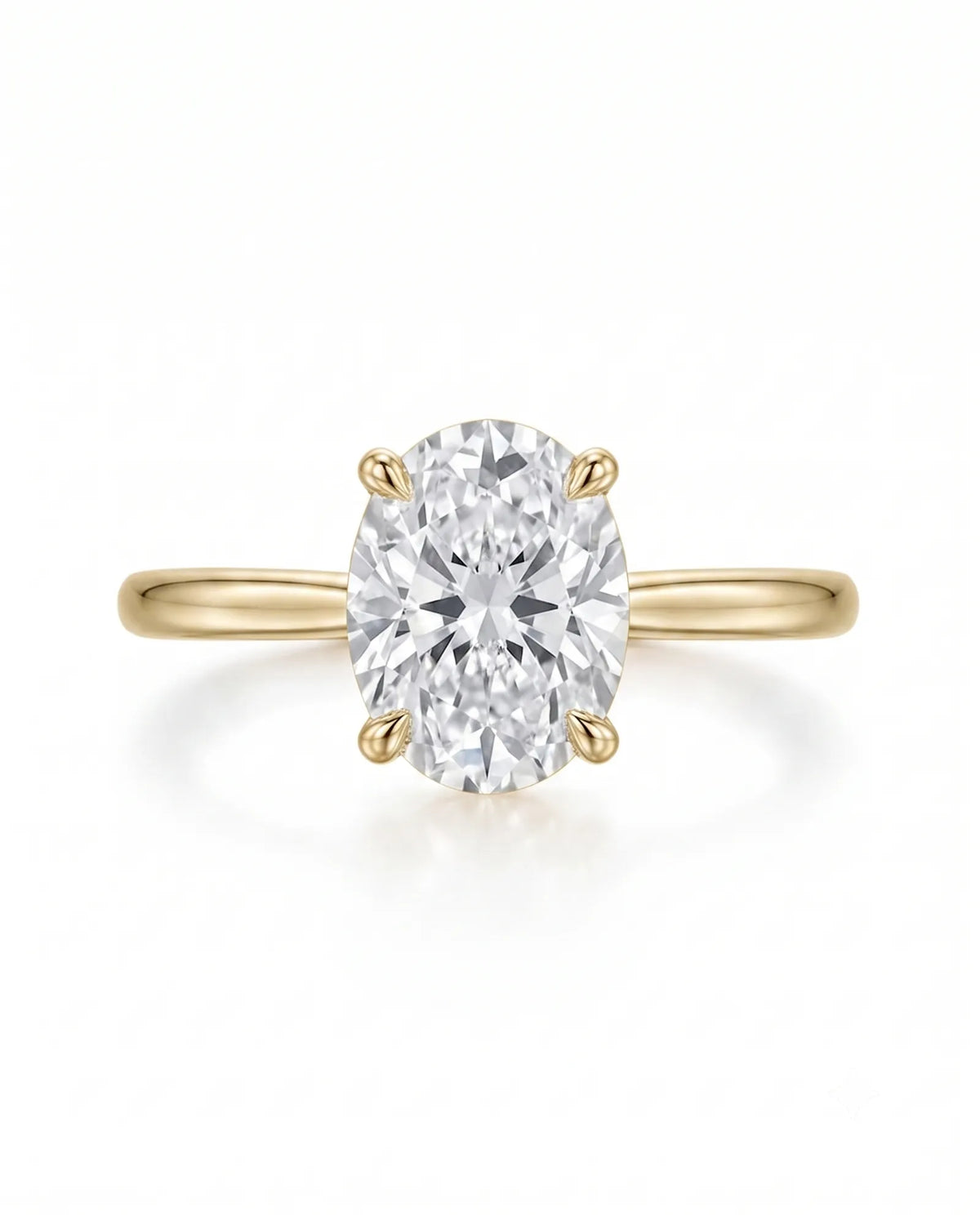 MIA 1 carat F-colour oval natural diamond cathedral solitaire ring in 18K yellow gold, front view of four-prong centre | SARATTI