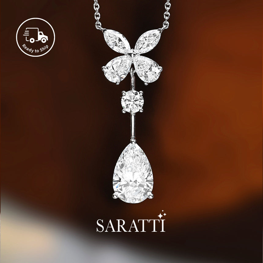 Close-up floral diamond cluster pendant | SARATTI