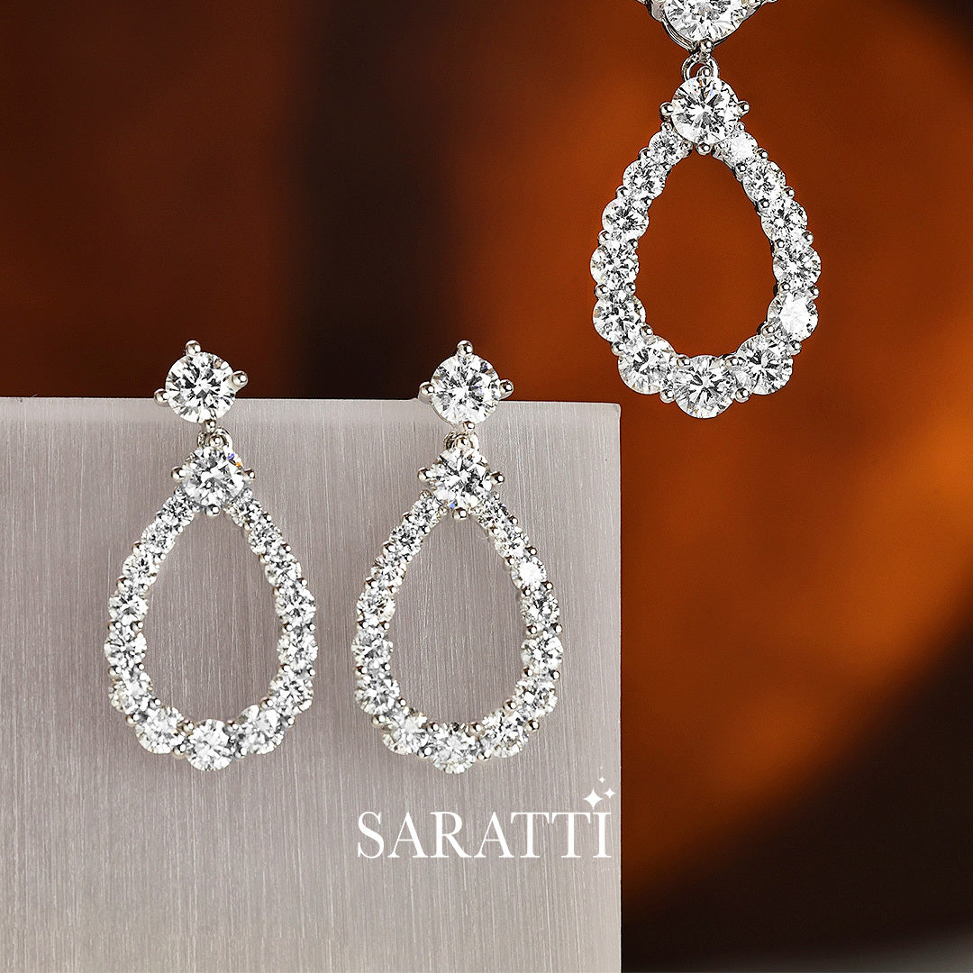 Cascade d’Éclat multi-drop diamond pendant and earrings | SARATTI