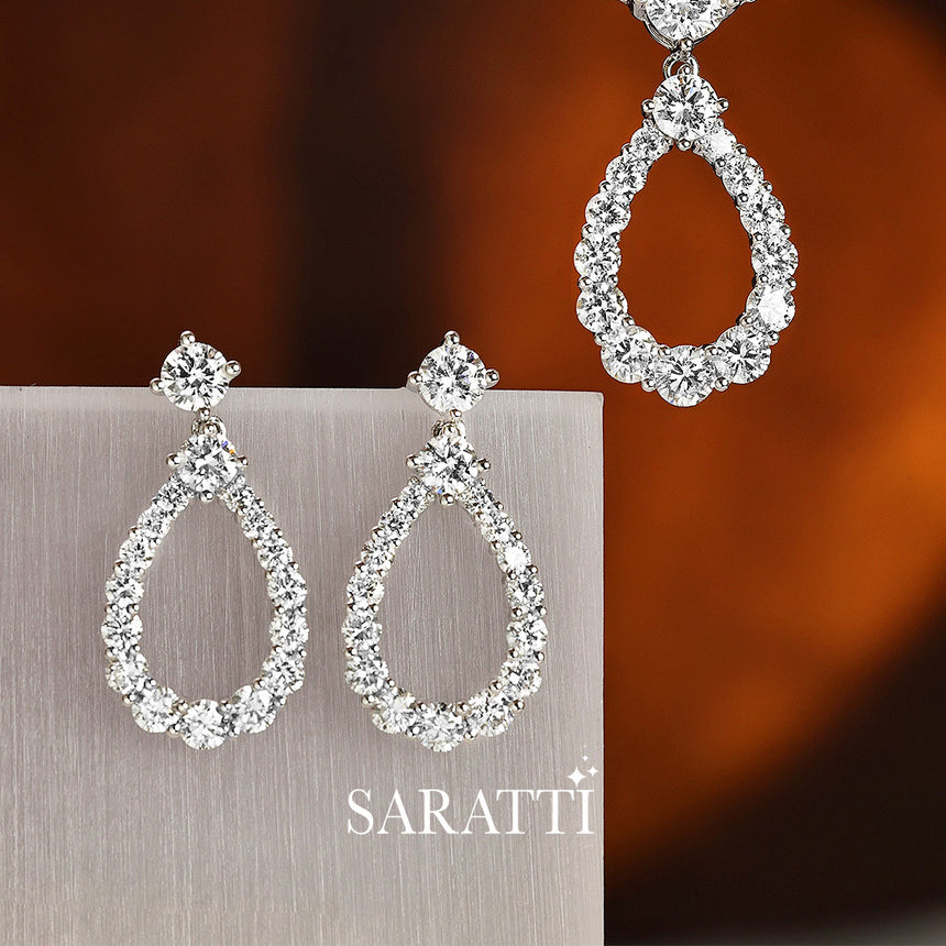Cascade d’Éclat multi-drop diamond pendant and earrings | SARATTI
