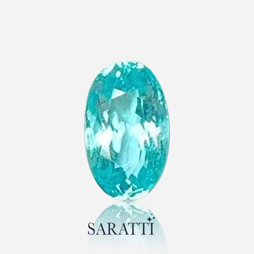 paraiba type tourmaline neon blue oval cut side angle light reflection | SARATTI