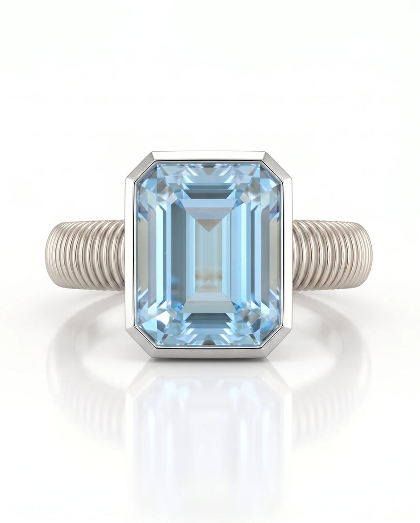 Rivage Bezel emerald-cut Aquamarine ribbed bezel solitaire ring setting in Platinum, side view | SARATTI