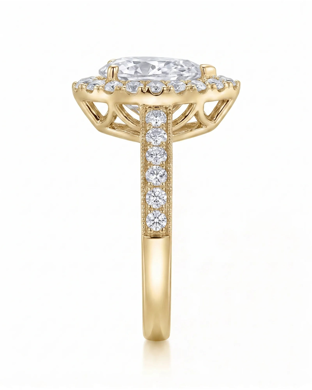 ROSE 1 carat F-colour pear natural diamond halo ring in 18K yellow gold, side profile showing raised halo gallery | SARATTI