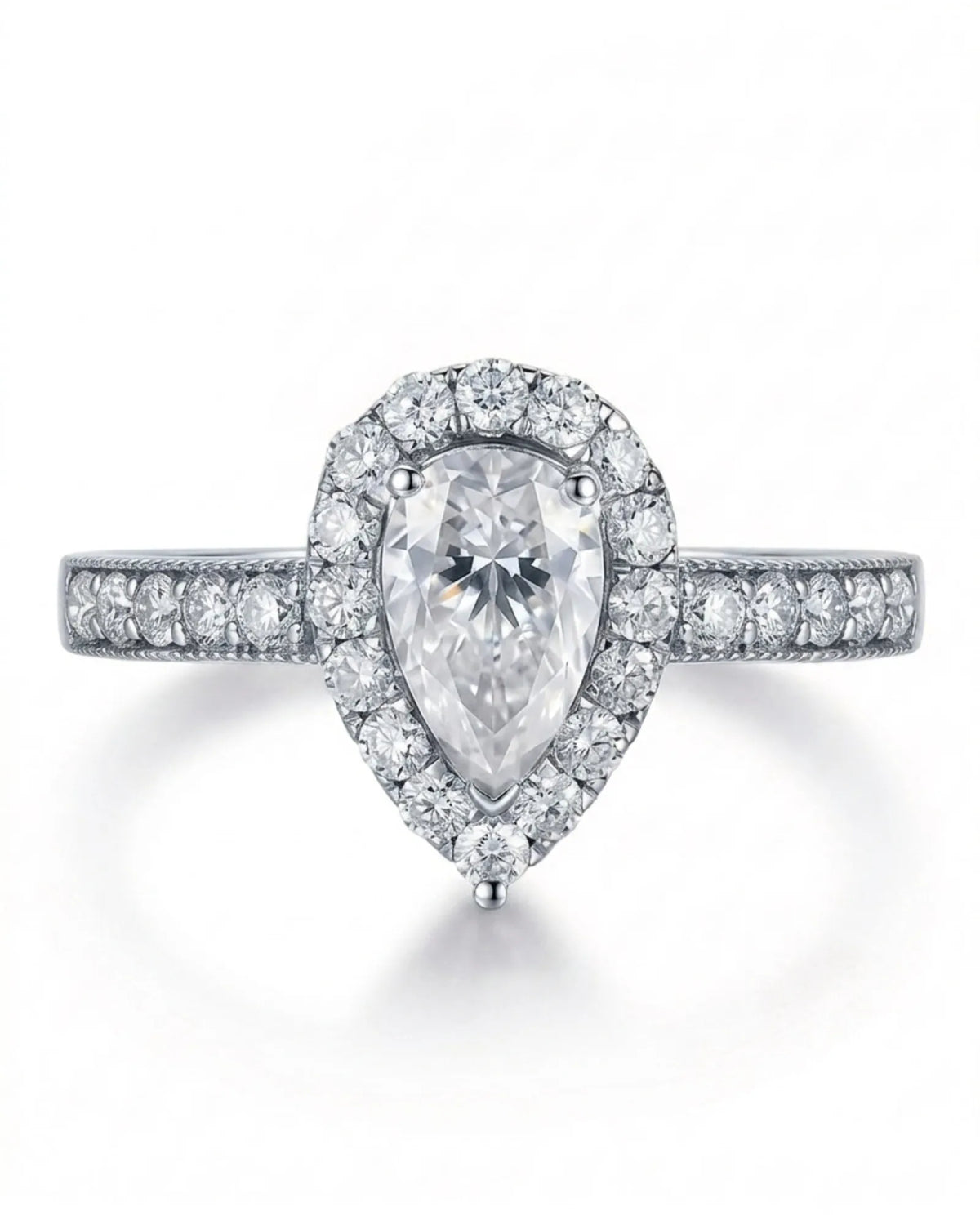 ROSE 1 carat F-colour pear natural diamond halo ring in platinum, front view of pear halo and pavé band | SARATTI