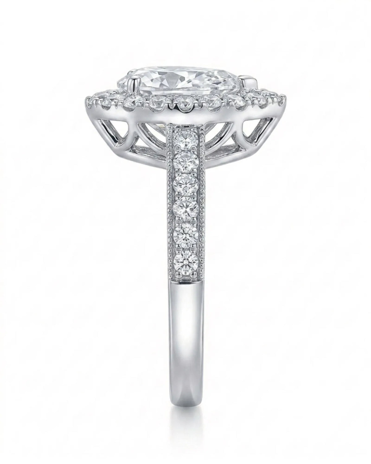 ROSE 1 carat F-colour pear natural diamond halo ring in platinum, side profile showing raised halo gallery | SARATTI
