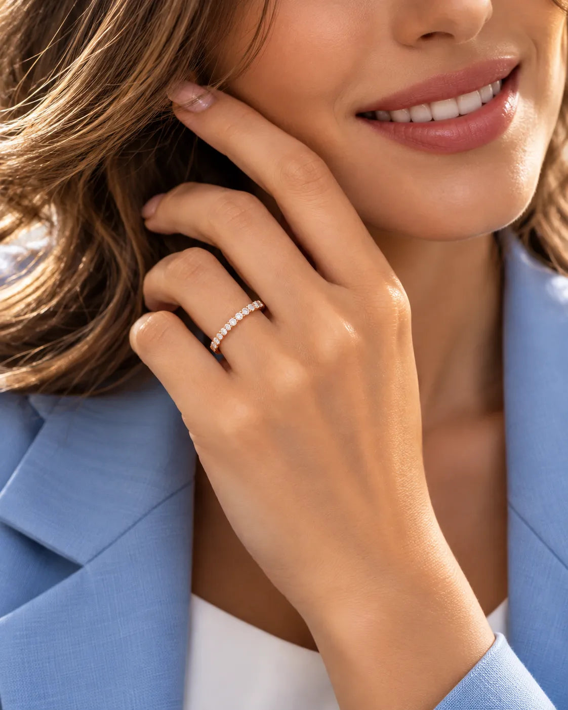 Beauty portrait featuring the round diamond half eternity wedding band in 18K rose gold | SARATTI