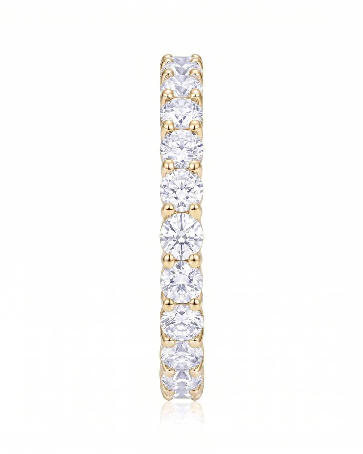 18K yellow gold half eternity diamond band with round diamonds across the visible face | SARATTI