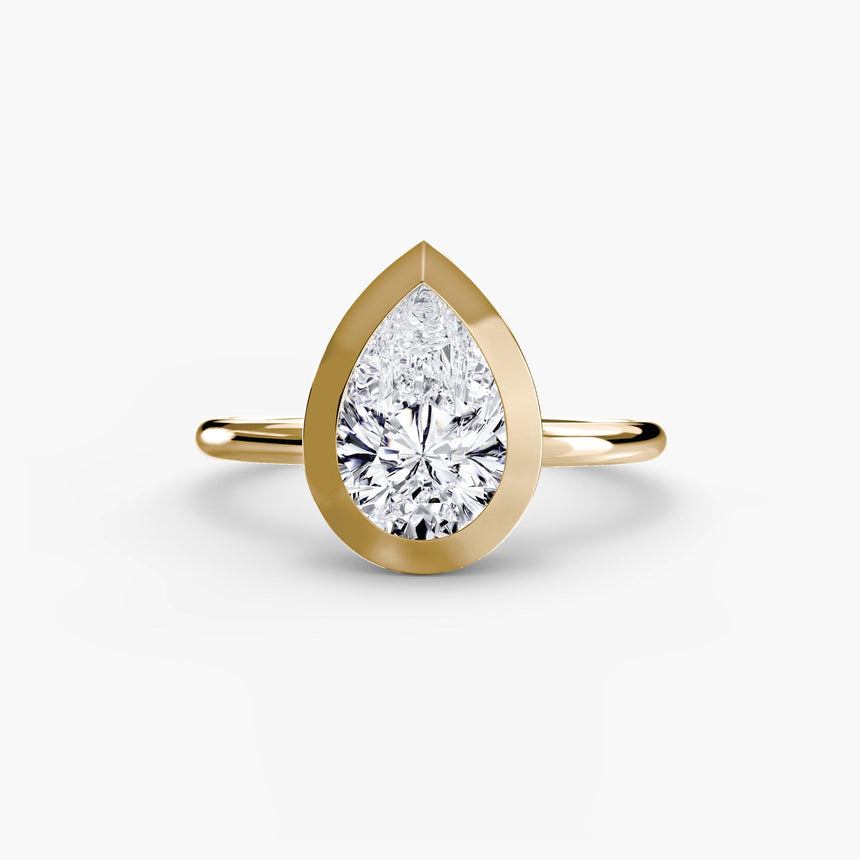 SOLARA – Pear Cut Bezel-Set Solitaire Ring Setting in Yellow Gold | SARATTI