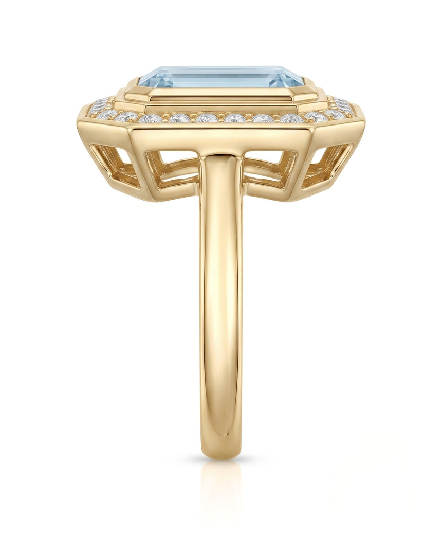 Solenne Halo emerald cut Aquamarine diamond cathedral ring setting in yellow gold, profile view | SARATTI