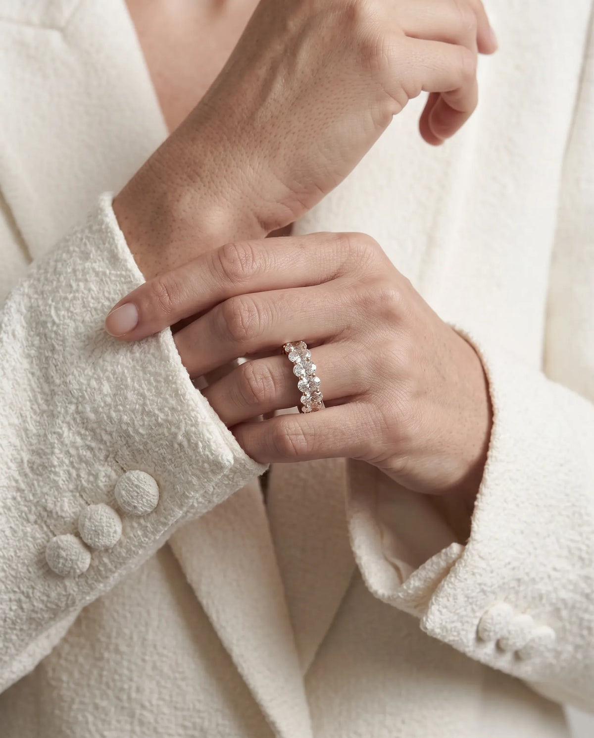 Thick oval diamond wedding band with a complete circle of oval-cut diamonds | SARATTI