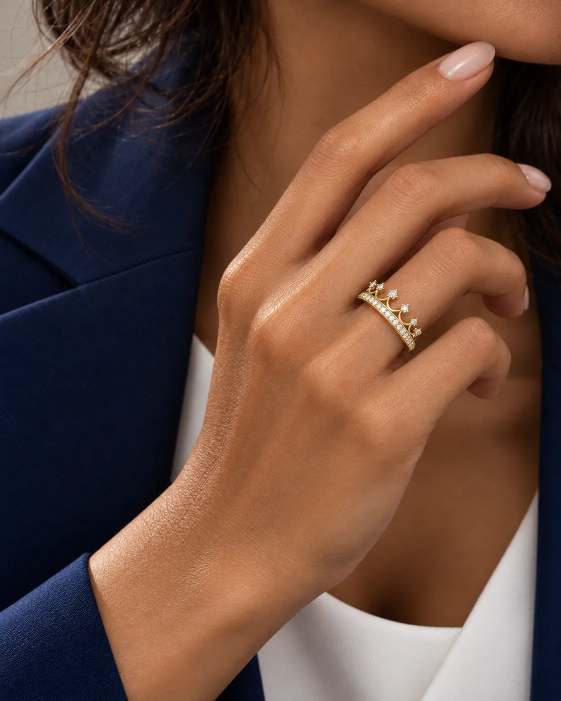Tiara diamond wedding band in 18K yellow gold styled on a model, highlighting the sculptural crown silhouette | SARATTI