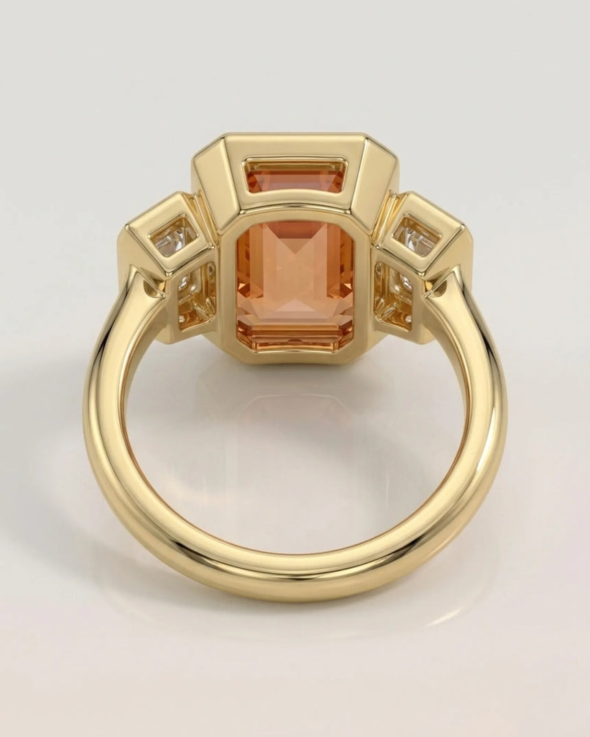 yellow gold emerald cut Topaz bezel setting with bright step-cut diamonds | SARATTI