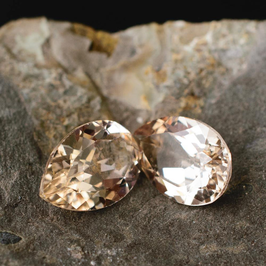 Perfectly matched imperial topaz gemstone pair