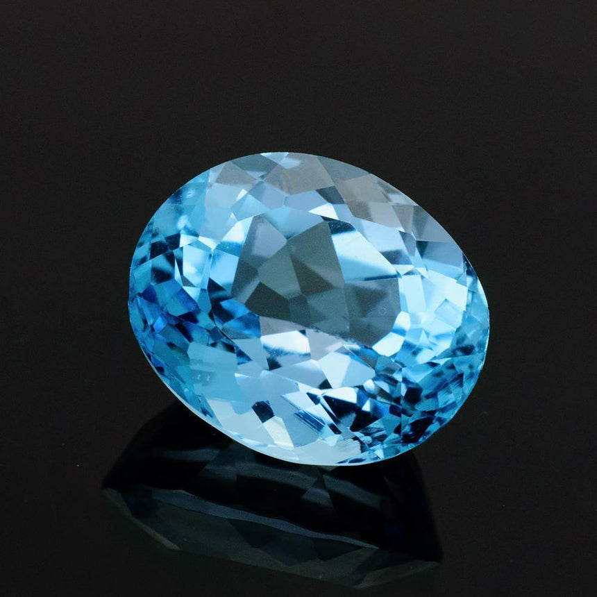 11.75 Carat Natural Brazilian Blue Topaz Oval Cut Gemstone - Modern Gem Jewelry