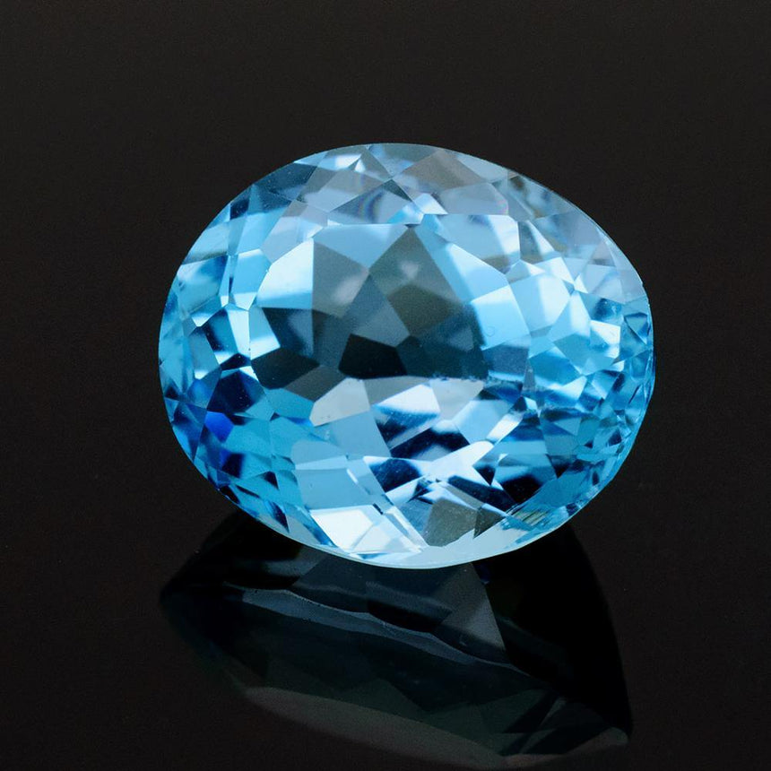 11.75 Carat Natural Brazilian Blue Topaz Oval Cut Gemstone - Modern Gem Jewelry