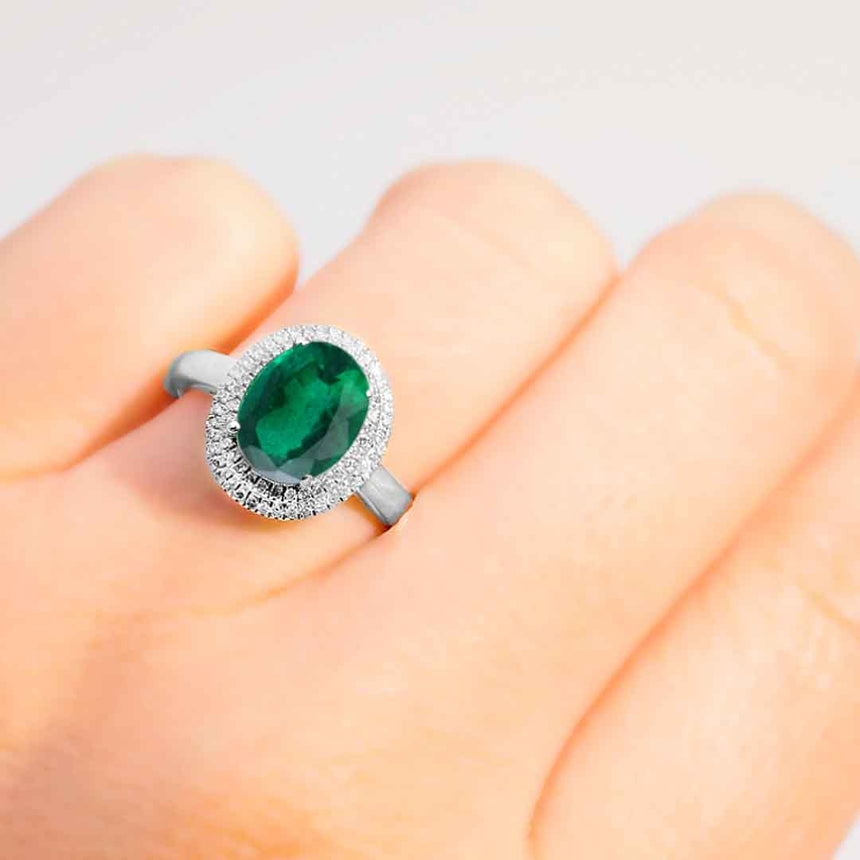 Emerald Birthstone Ring with Double Halo Diamonds in 18K White Gold | Custom Made Emerald Engagement Ring | Modern Gem Jewelry