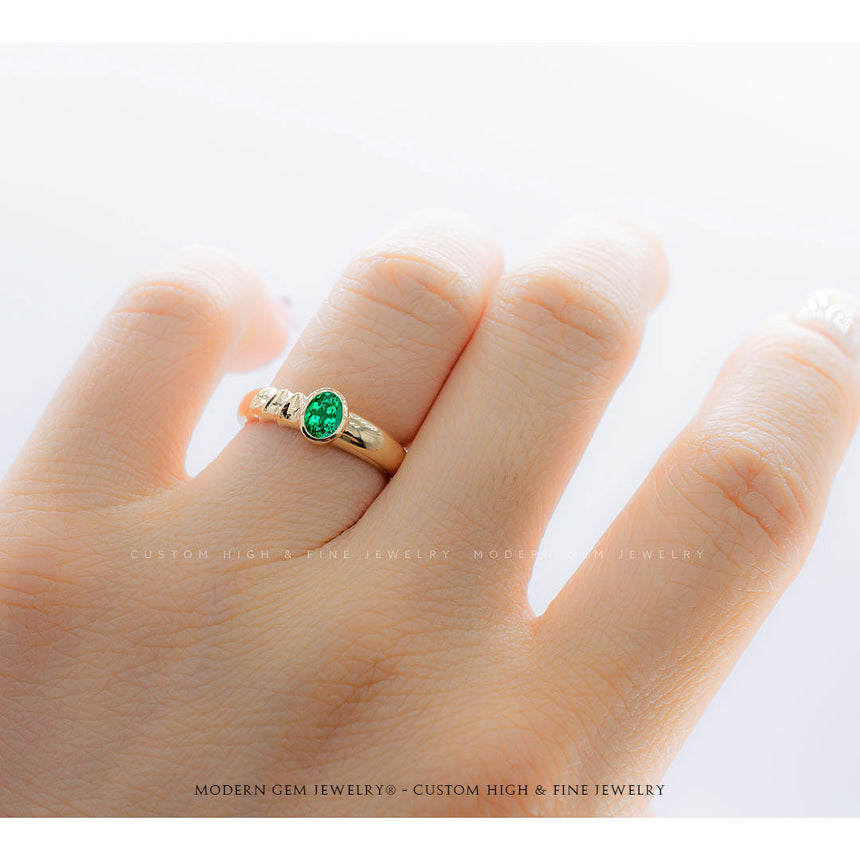 Oval Natural Emerald Bezel Set in 18K Yellow Gold