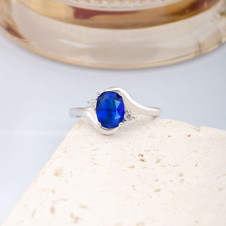 Unique Oval Sapphire Promise Rings | Oval Royal Blue Natural Sapphire and Dimaond Three Stone Ring in 18K White Gold | Modern Gem Jewelry | Saratti