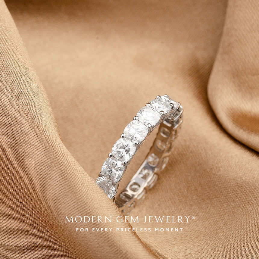 Cushion Cut Diamond Wedding Band in 18K White Gold in Eternity Band on Brown Silk  | Modern Gem Jewelry | Saratti