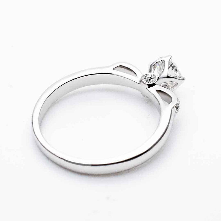 18K white gold natural 1.25 ct. round diamond engagement ring