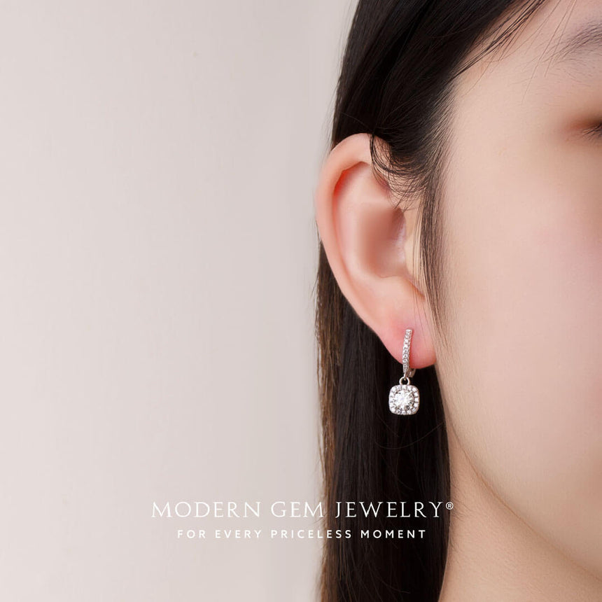 Model wears diamond pave hoop earrings