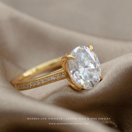 Prong Set Yellow Gold oval diamond engagement ring