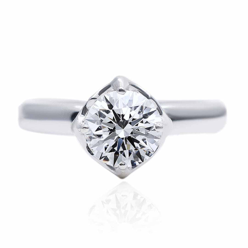Brilliant Round Four Prong Engagement Ring in 18K White Gold