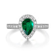 Emerald Cocktail Ring with Diamonds Halo in 18K White Gold | Modern Gem Jewelry | Saratti
