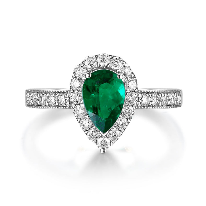 Emerald Cocktail Ring with Diamonds Halo in 18K White Gold | Modern Gem Jewelry | Saratti