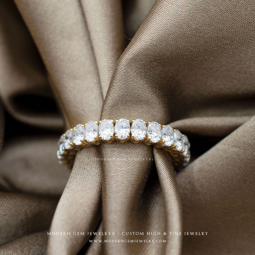 Oval Diamond Wedding Band in 18K Yellow Gold in silk sheet | Modern Gem Jewelry | Saratti
