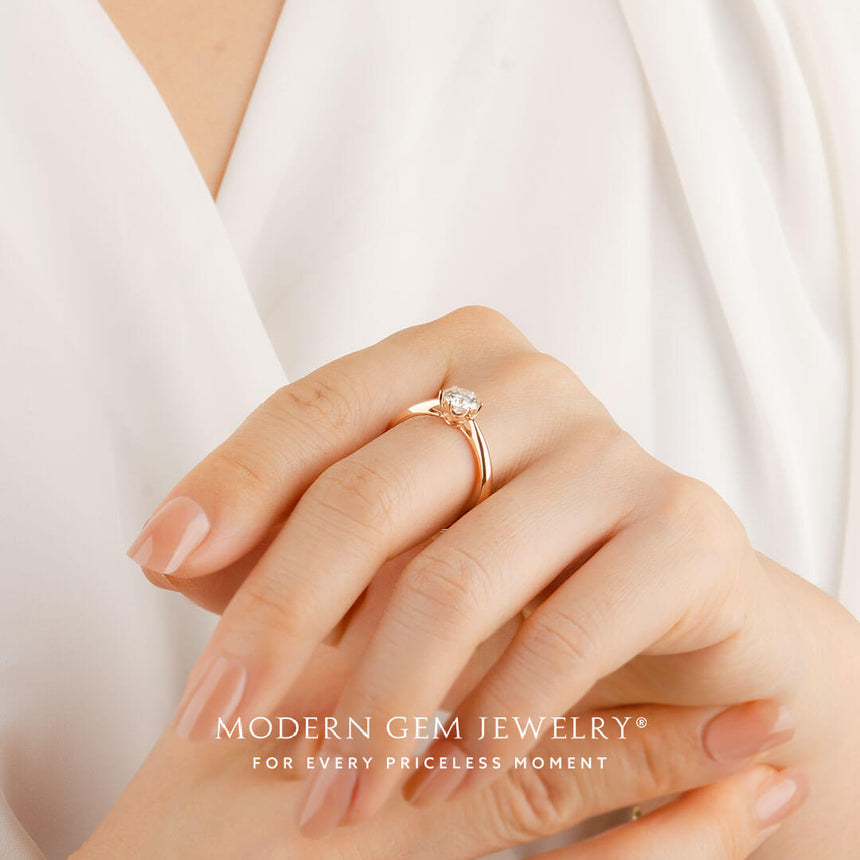 minimalist round diamond 18K rose gold ring on model