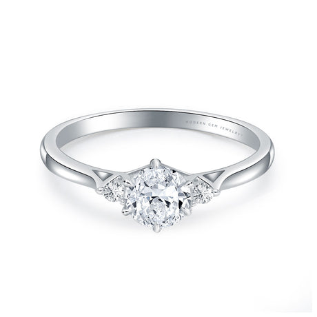 Prong Set Oval Diamond Three Stone Engagement Ring
