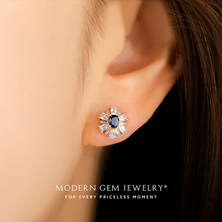 Model wears the oval sapphire and diamond stud earrings