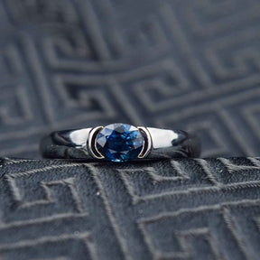 Classic Bezel Set Oval Blue Sapphire White Gold Ring | Modern Gem Jewelry | Saratti