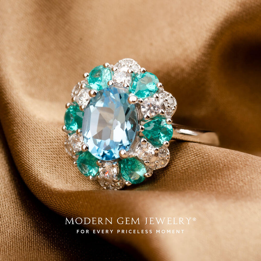 Diamond and Apatite Halo Natural Blue Topaz Ring