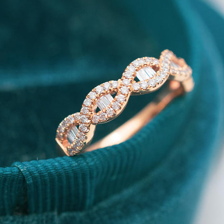 Rose Gold Eternity Band with Baguette and Pave Set Diamonds on Green Silk | Modern Gem Jewelry | Saratti