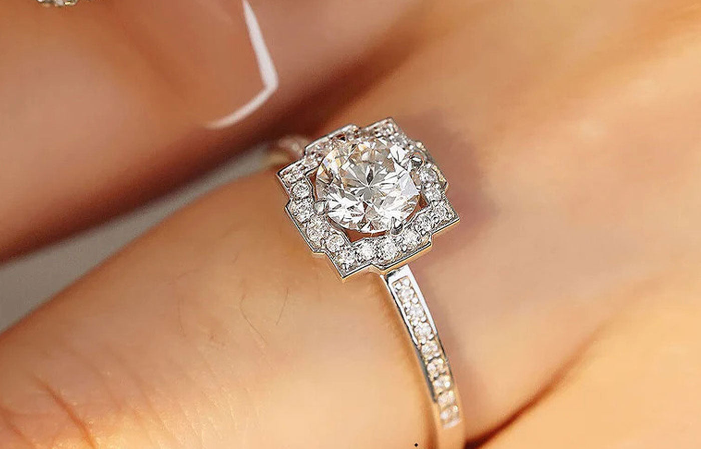 Unique Diamond Halo Ring with Pave Set Diamond Accents | Saratti