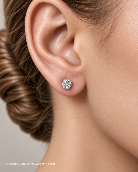 1.00 ct. tw. lab-grown round diamond studs in platinum, fair skin on-ear model | SARATTI