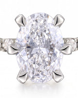 Gretta • Oval Moissanite Ring in Yellow Gold