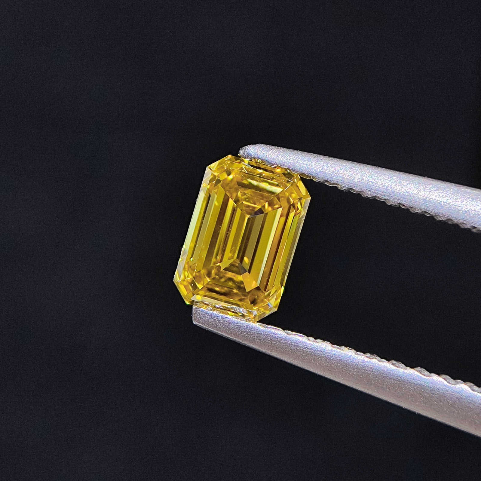 1.01 cts Fancy Deep Yellow Emerald Cut Natural Diamond | GIA Certified