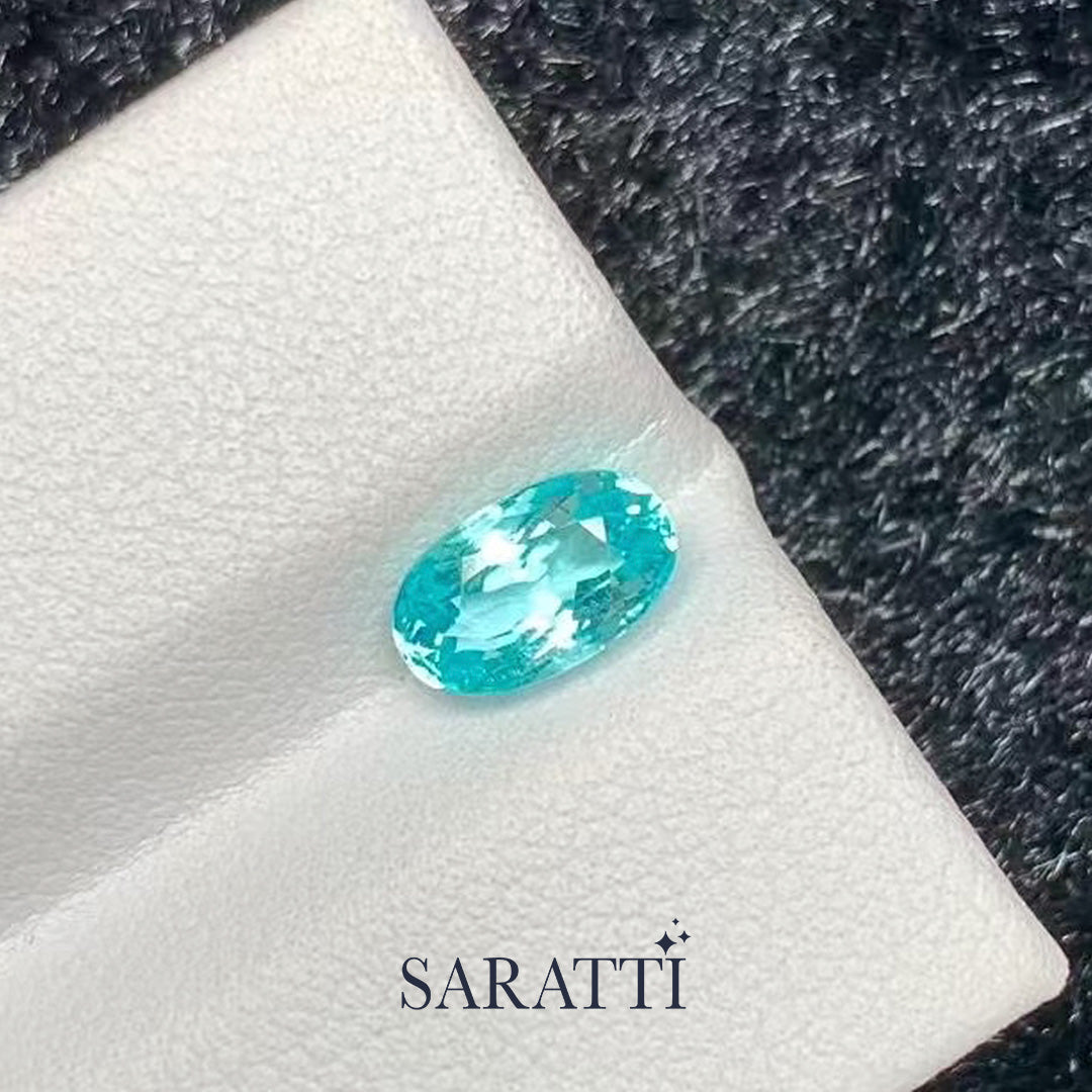 1.11 carat neon blue tourmaline oval cut faceted loose gemstone macro | SARATTI