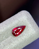 Alternate view of 1.15 CTS Natural Mozambique vivid red Ruby pear showing its elongated outline and facet pattern | SARATTI