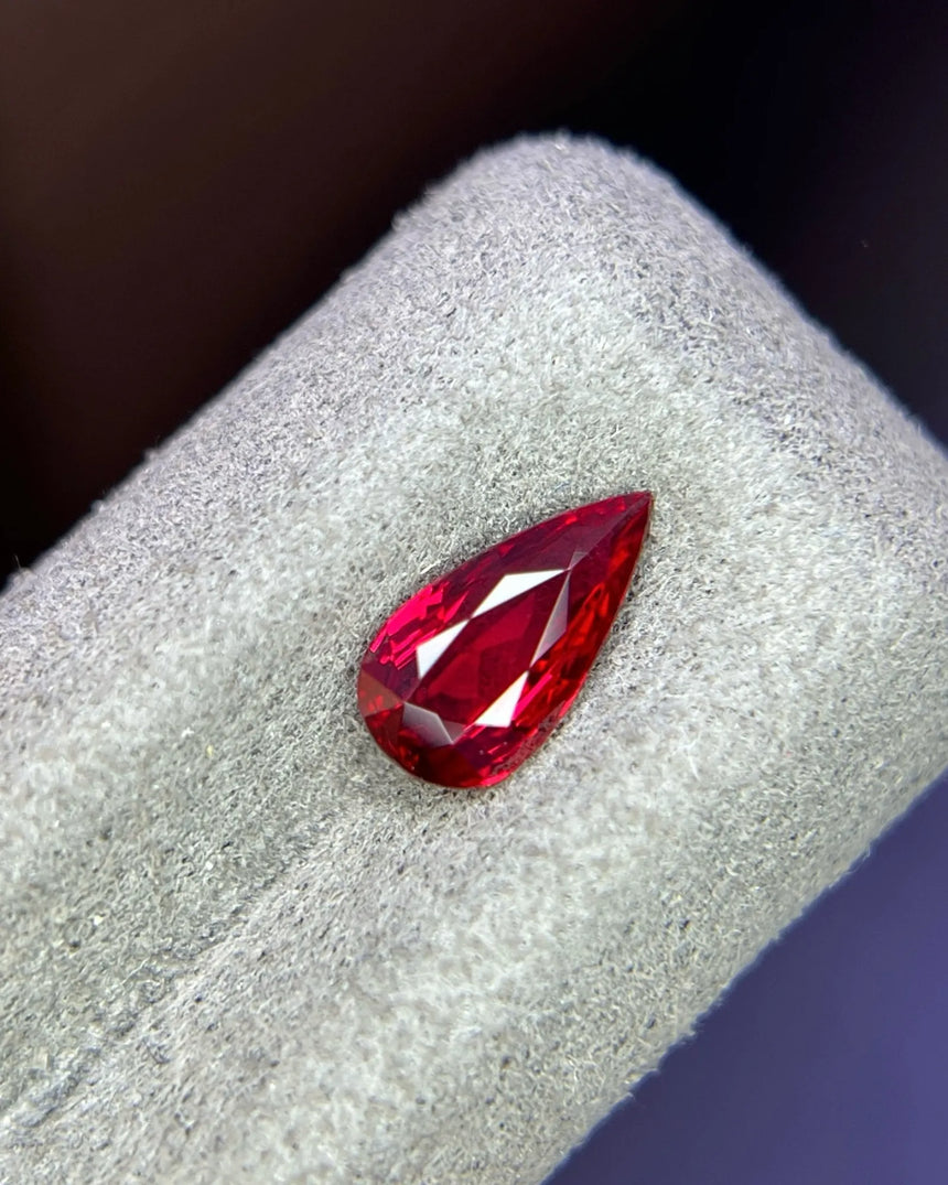 1.15 CTS Natural Mozambique vivid red Ruby pear main view showing elongated brilliant and step faceting | SARATTI