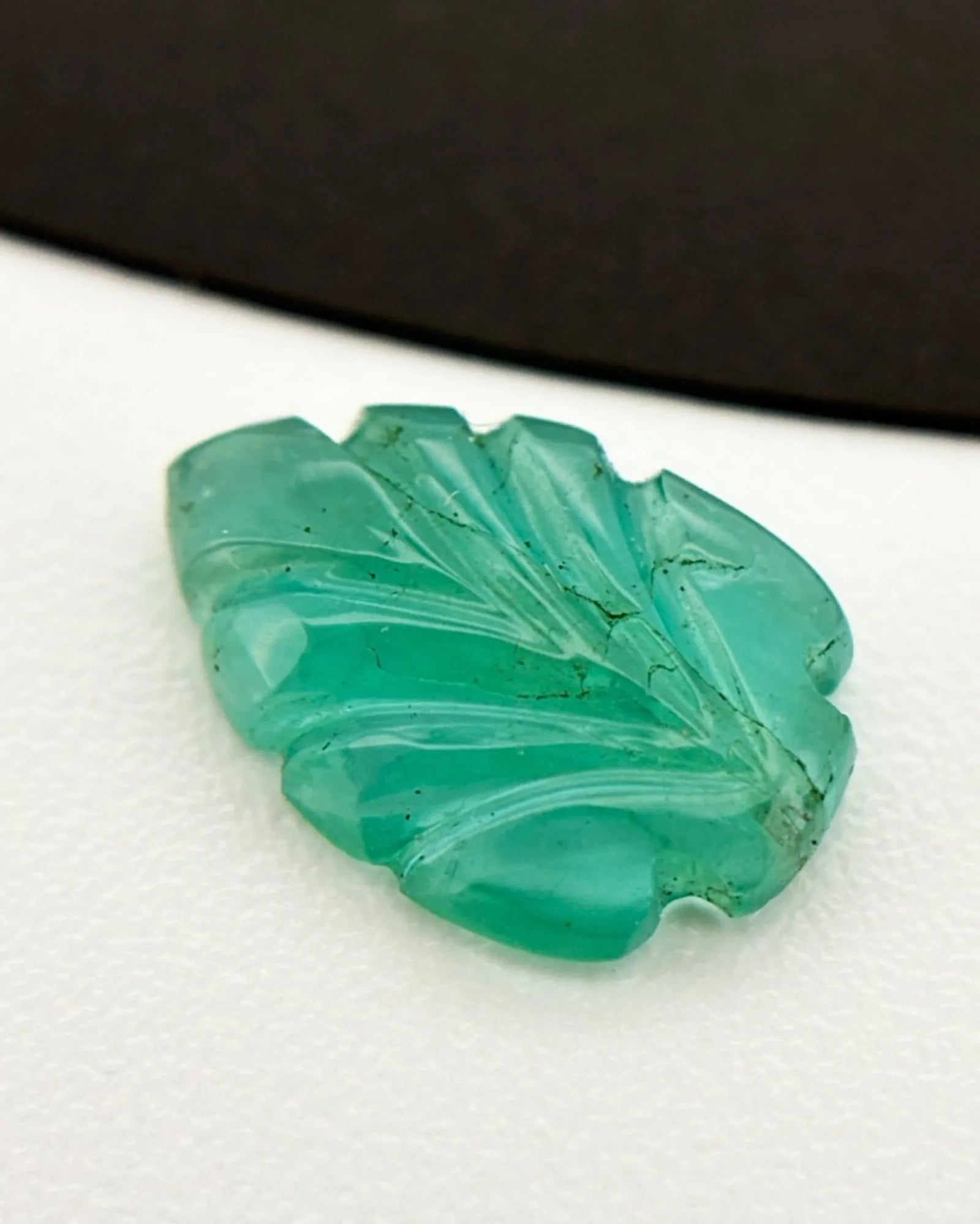 1.18ct Natural Emerald carved leaf main view in vivid green - SARATTI