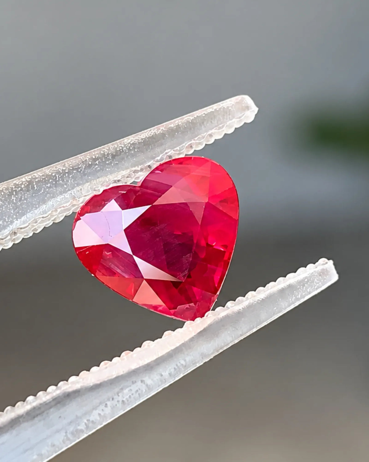 Heart-shaped Natural Burmese Ruby showing modified brilliant faceting and vivid red colour | SARATTI