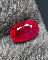 Natural 1.32 CTS oval Ruby shown from an alternate angle with rich red colour and facet detail | SARATTI