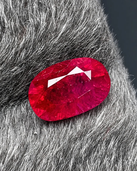 Natural 1.32 CTS oval Ruby shown from an alternate angle with rich red colour and facet detail | SARATTI