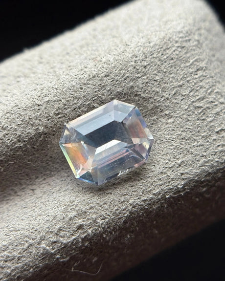 Natural Moonstone octagonal step cut at an angle showing broad geometric facets and cool central reflections | SARATTI