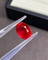Natural red Ruby weighing 1.37 CTS shown from an alternate oval gemstone angle | SARATTI
